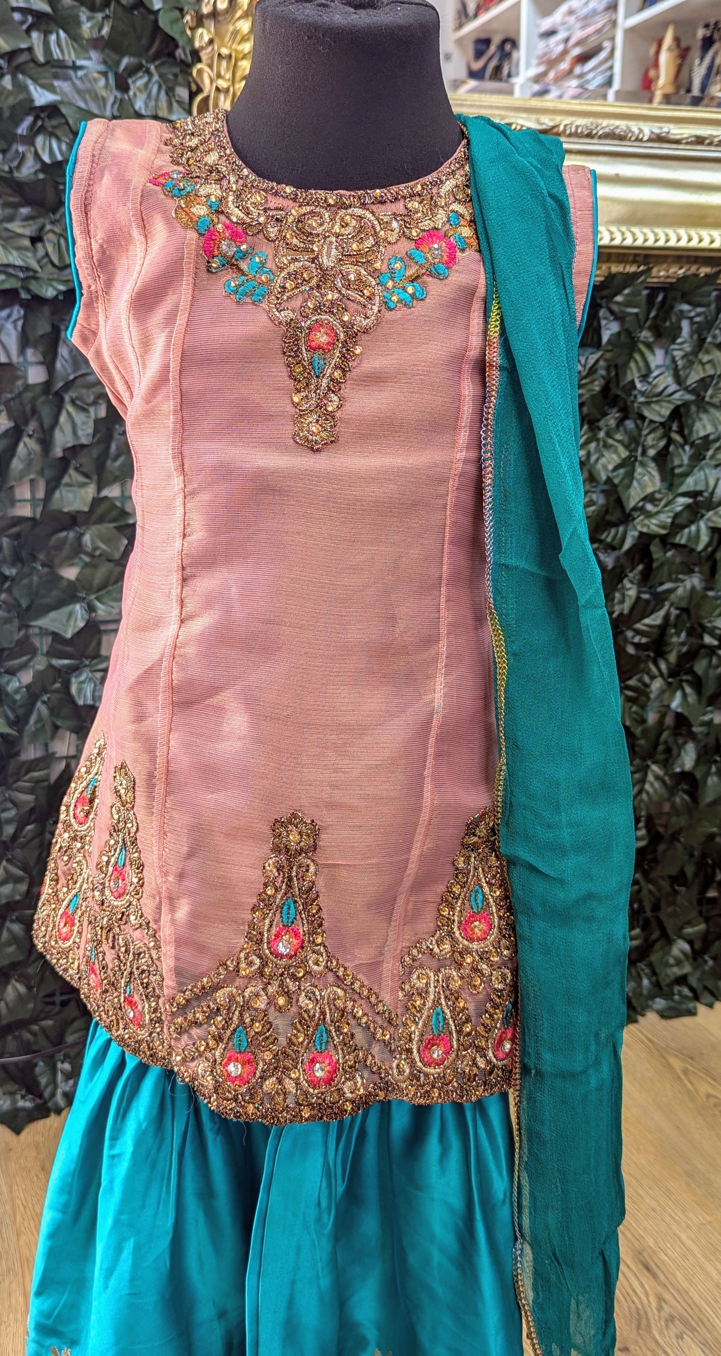 Pink and blue embroidered outfit